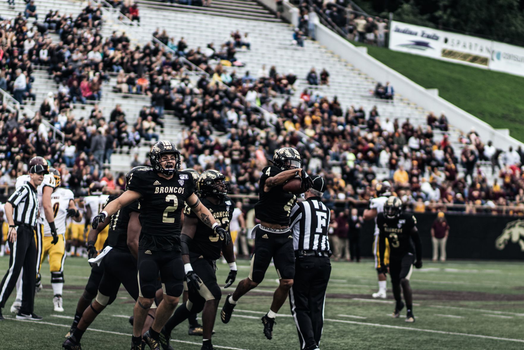 Senior safety Justin Tranquill celebrates a defensive stop against CMU